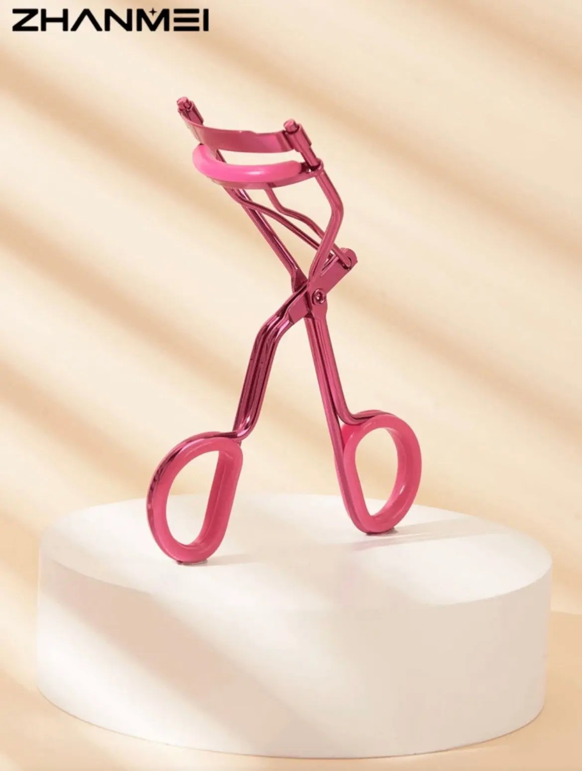 Encrespador de pestañas rosa